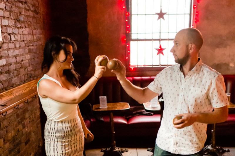 Image for Chiara and Andrew’s Skee Ball and Air Guitar Engagement Shoot