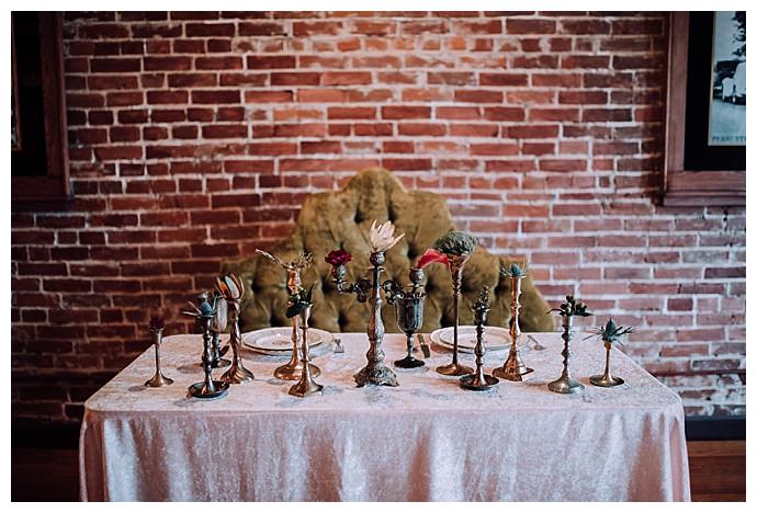 vintage-candlesticks-wedding-decor-brittany-eitsert-photography