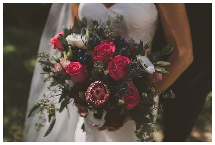 pink-roses-blue-thistle-bridal-bouquet