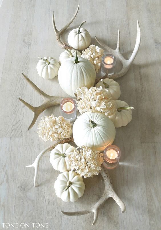 cream-pumpkins-and-antlers-wedding-centerpiece