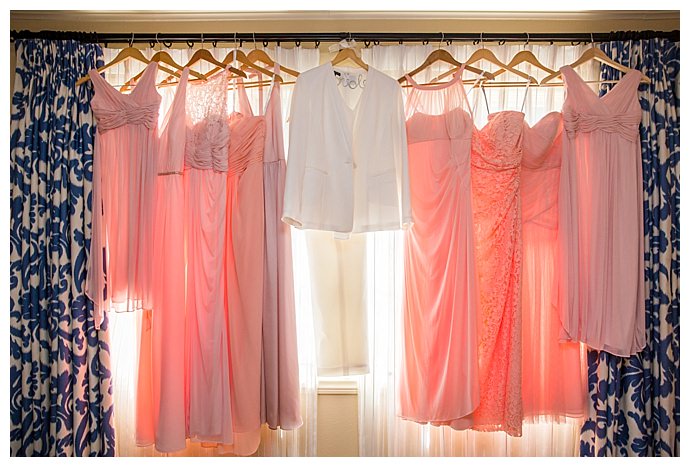 bridal-wedding-suit-and-pink-bridesmaid-mismatched-dresses