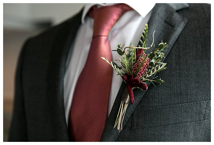 red-and-green-boutonniere-hattie-root-photography