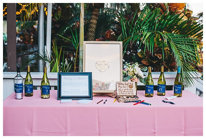 blush and navy wedding welcome table