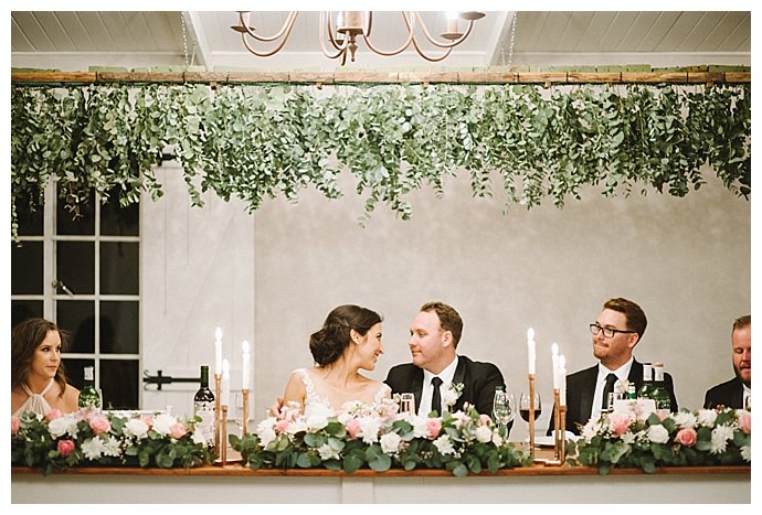 bright-girl-photography-head-table-hanging-greenery