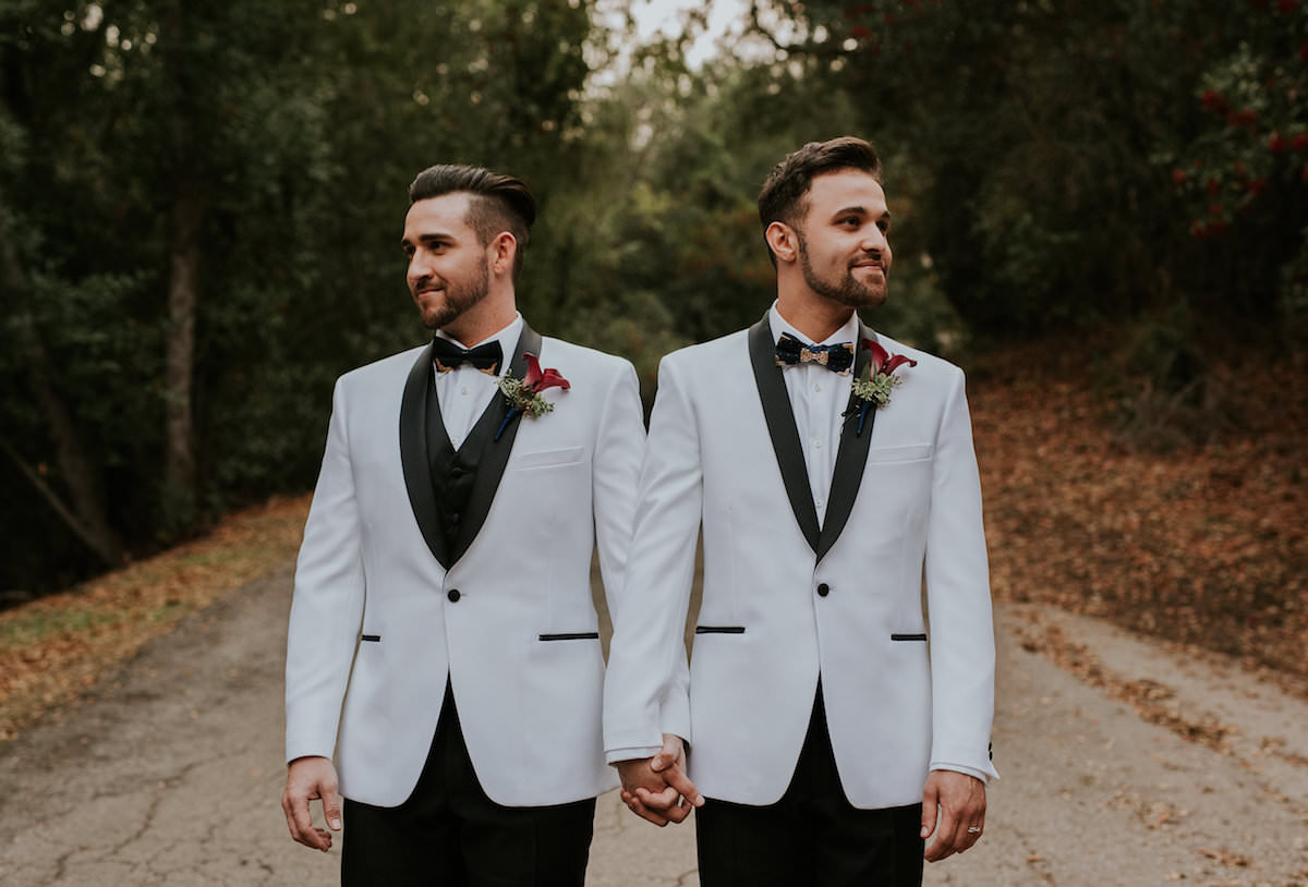 white-tuxedo-jacket-black-pants-wedding-outfit