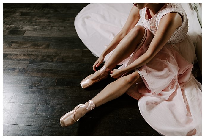 bride wearing ballet slippers