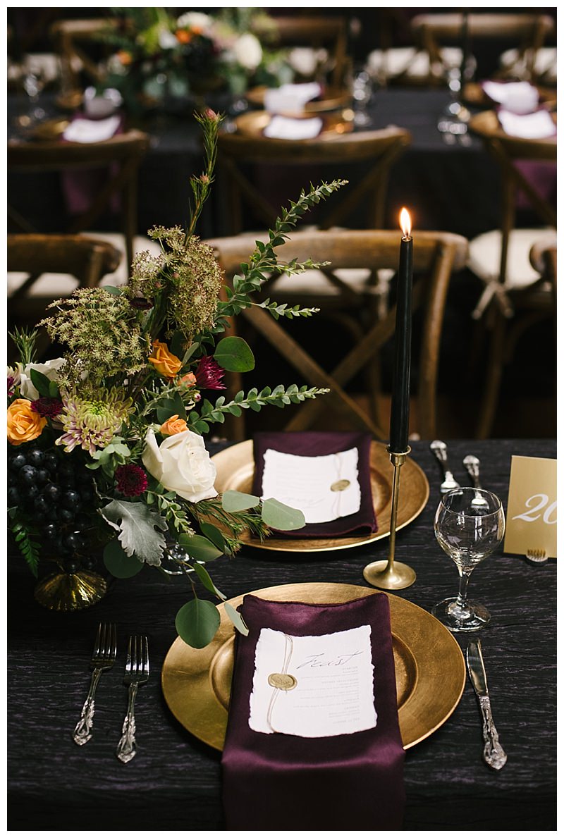 metallic-burgundy-tablescape-with-taper-candles