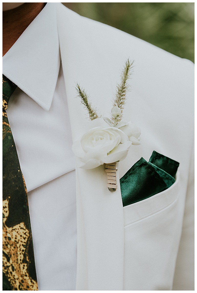 white-suit-with-green-pocket-square