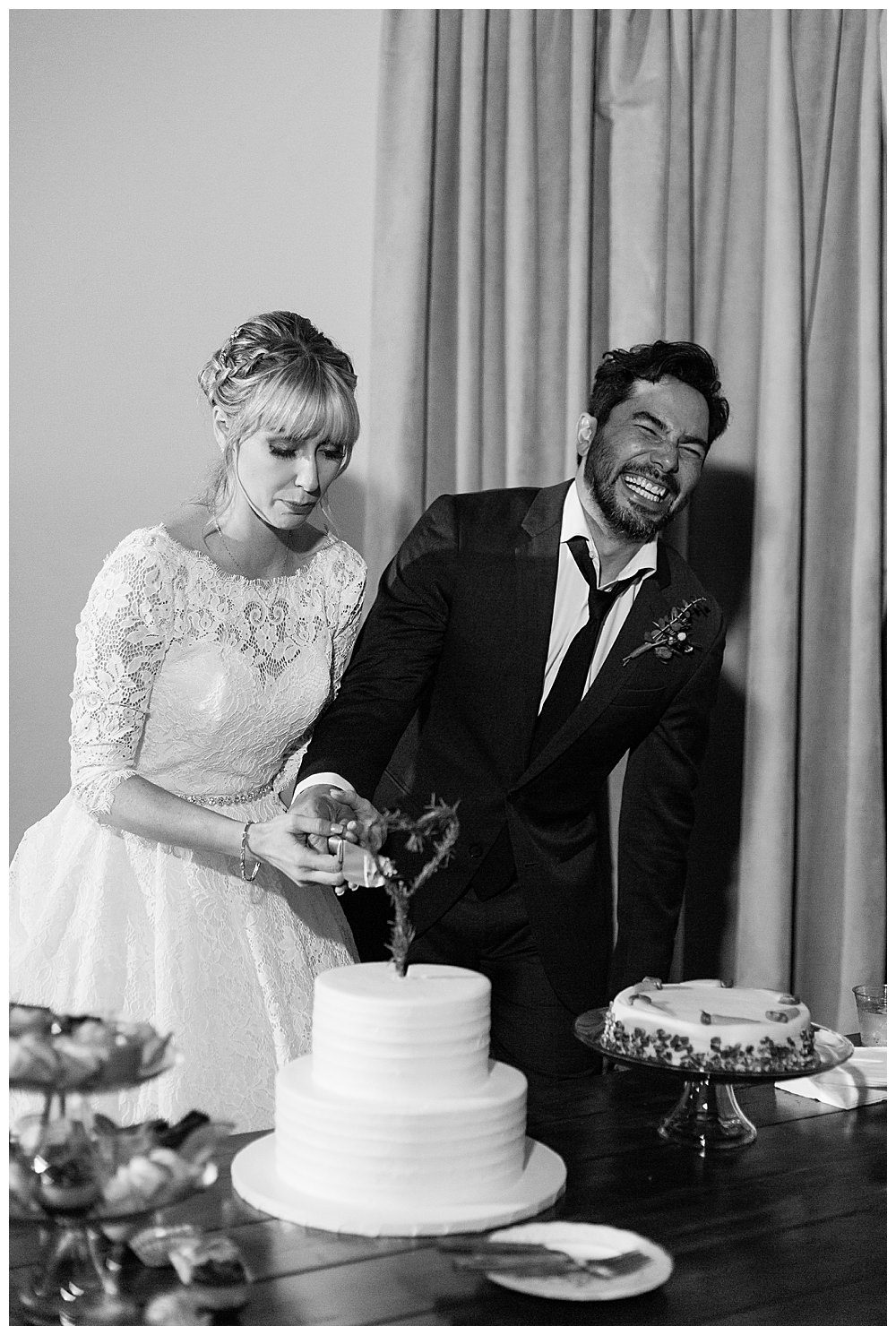 black-and-white-cake-cutting-wedding-photography