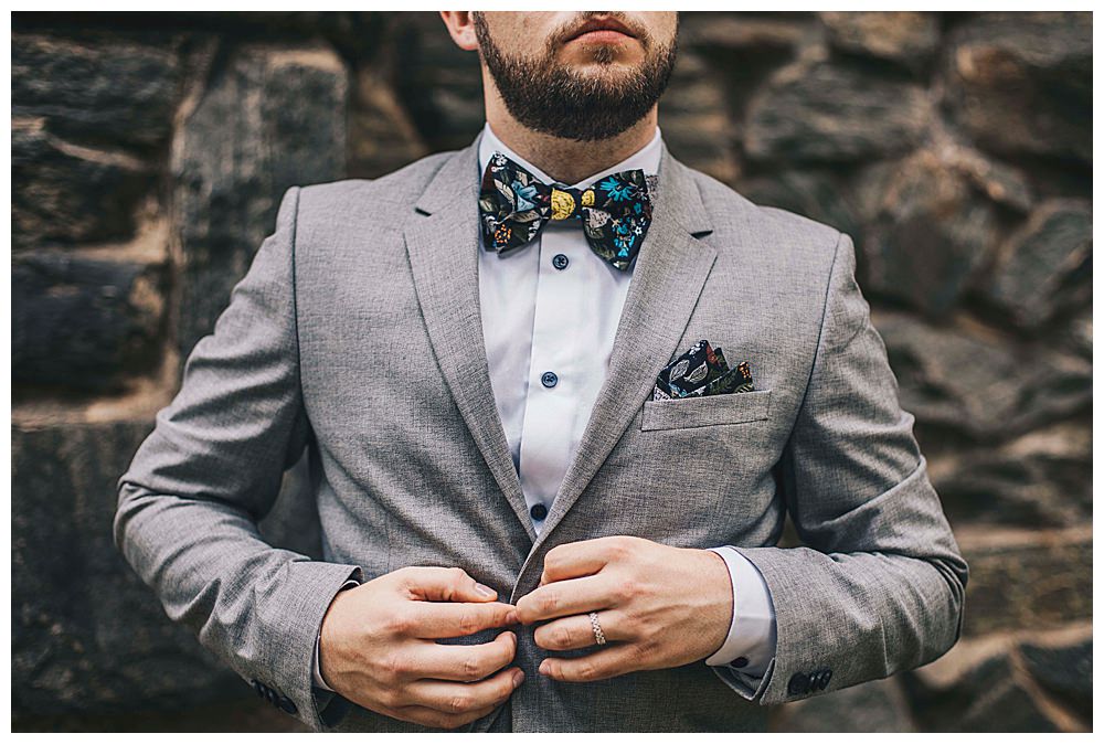 gray-suit-with-floral-bow-tie