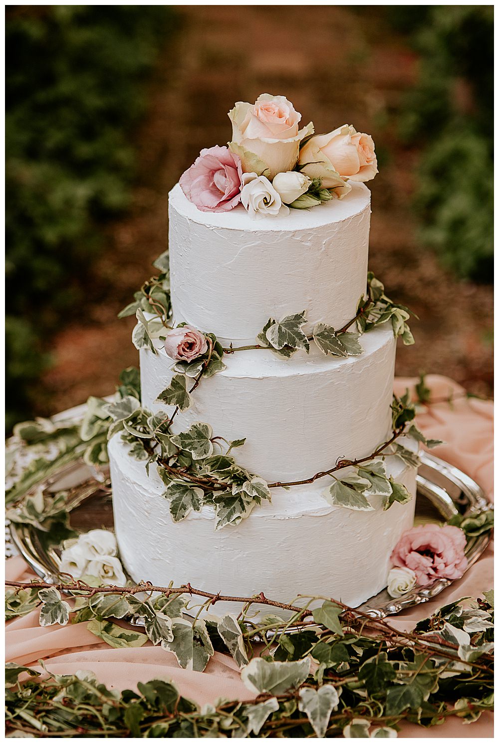 white-buttercream-wedding-cake-with-flowers