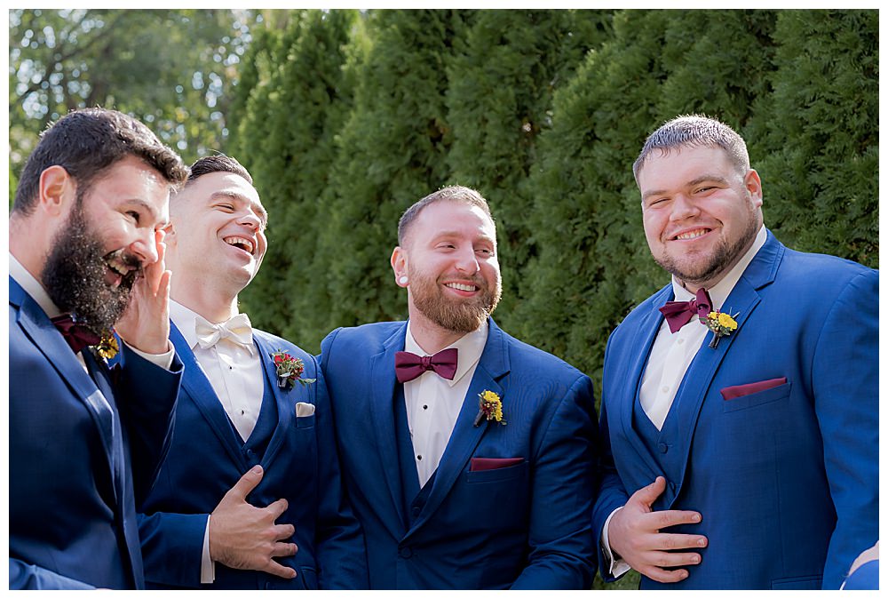 blue-suit-with-maroon-accessories-groomsmen