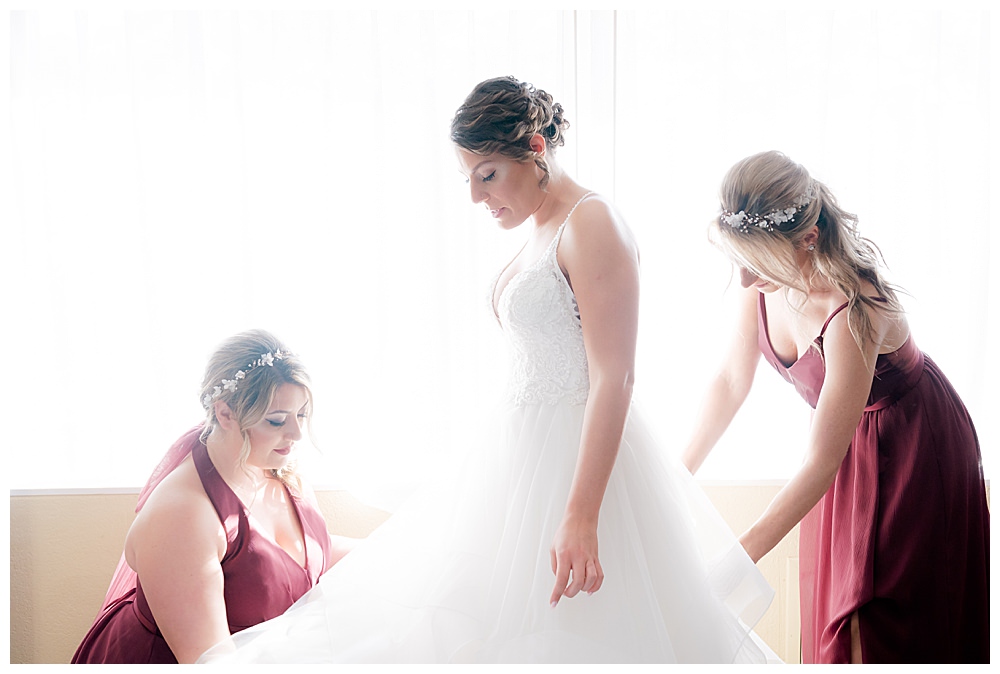 bride-getting-ready-with-bridesmaids