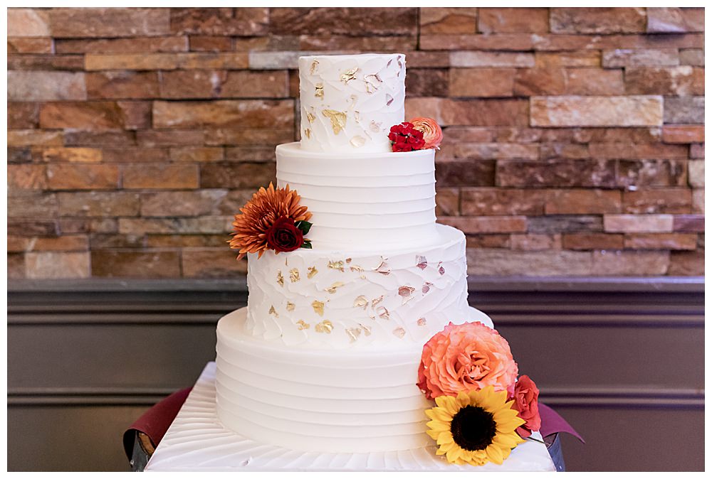 white-wedding-cake-with-gold-flecks