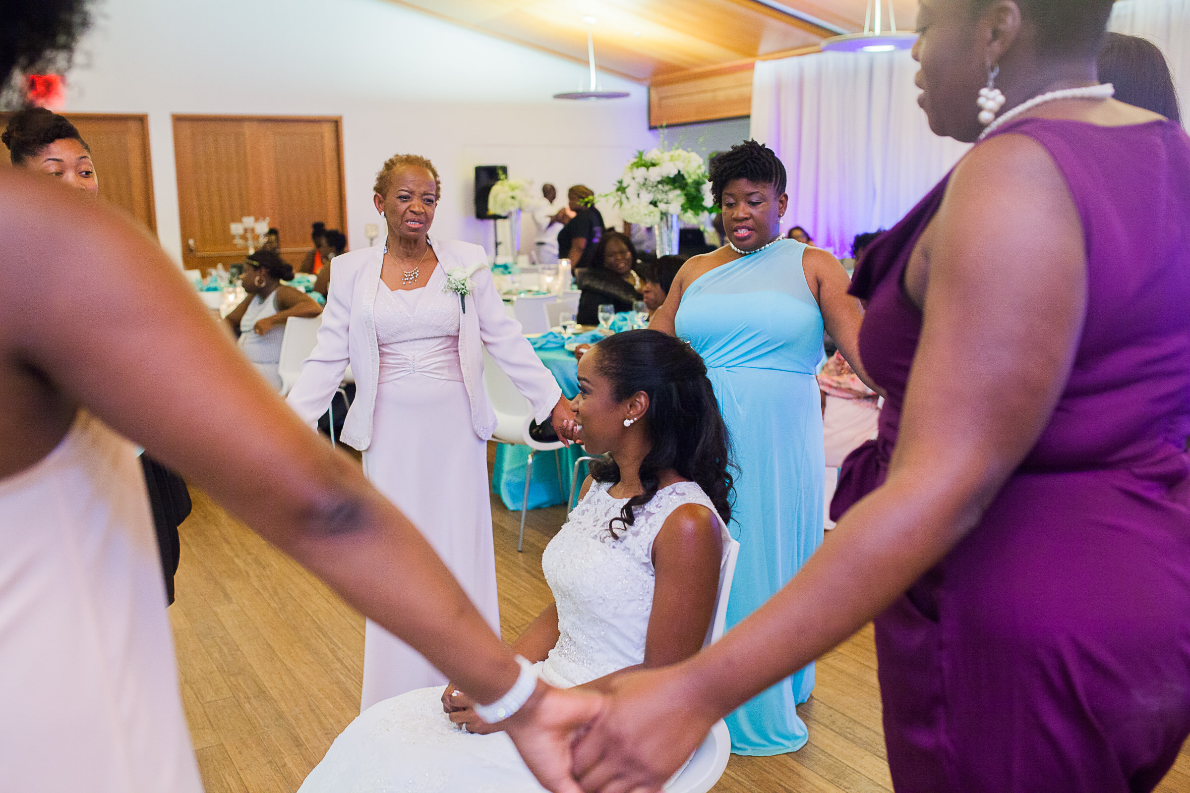 Alpha Kappa Alpha sorority sisters serenading the bride