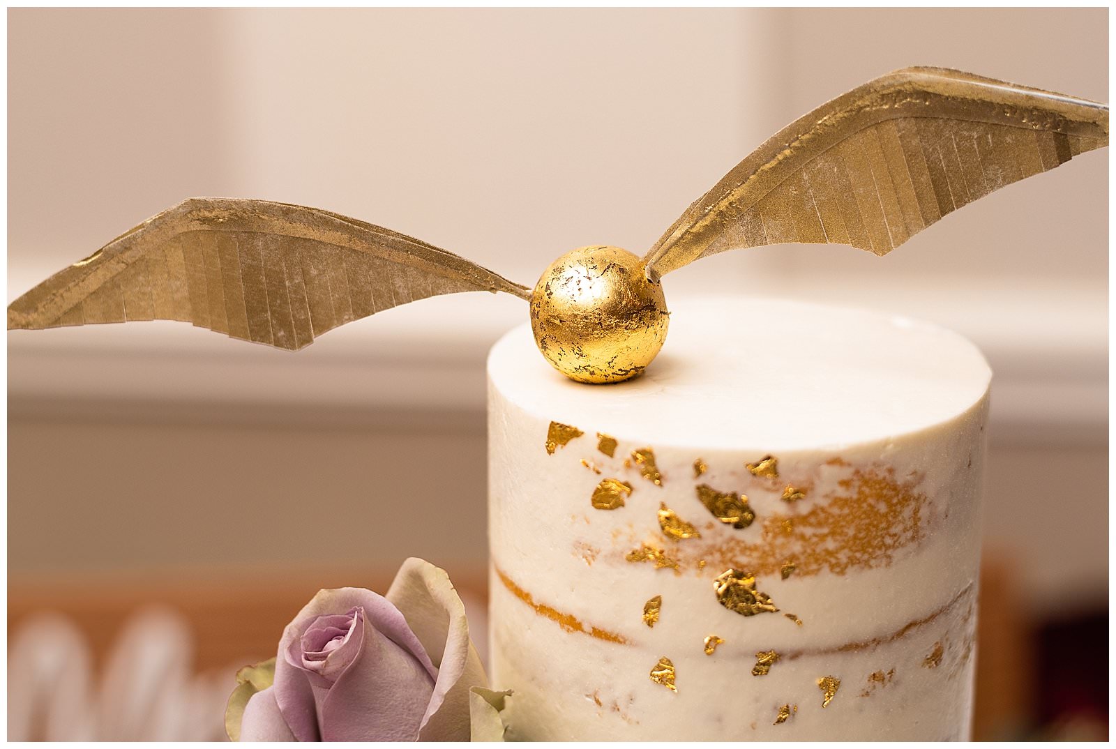 golden-snitch-wedding-cake-topper