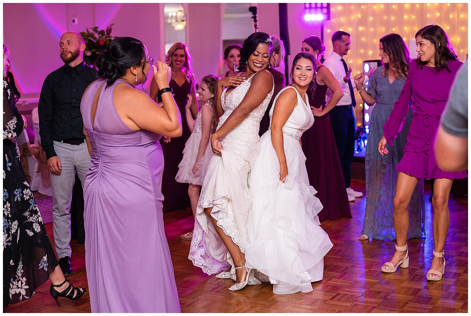 two-brides-dancing