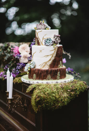 Faux Wood Wedding Cake with Glitter and Flowers