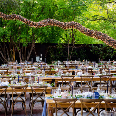 Outdoor Wedding Reception with Farmhouse Tables and Twinkly Lights