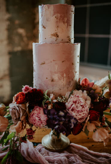 Pink and White Watercolor Wedding Cake with Gold Flecks