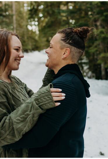 Lesbian Winter Engagement Session in Oregon Forest