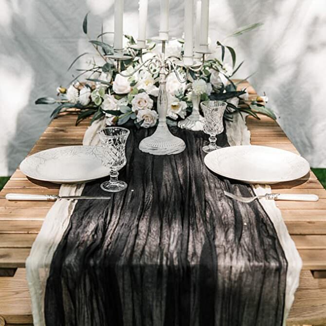 https://loveincmag.com/wp-content/uploads/2022/10/black-tulle-table-runner-halloween-wedding-amazon-decor-670x670.jpg