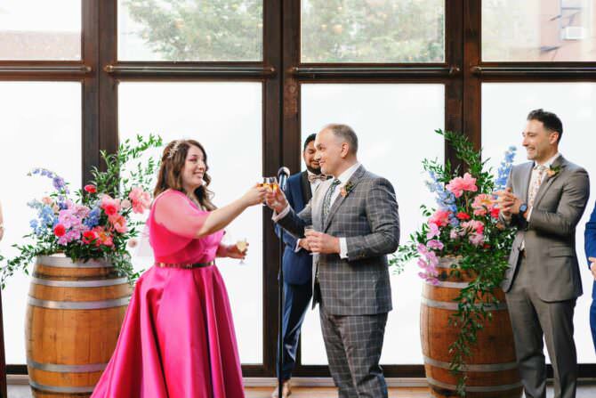 A Brooklyn Wedding with Colorful Blooms, Pink Dress, Donuts, and Pickleback Shots!