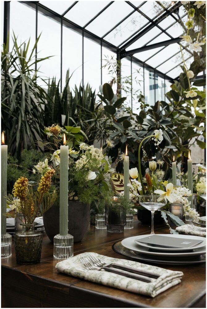 Elegant table setting with candles and flowers