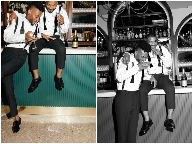 Two friends enjoying drinks at a bar.