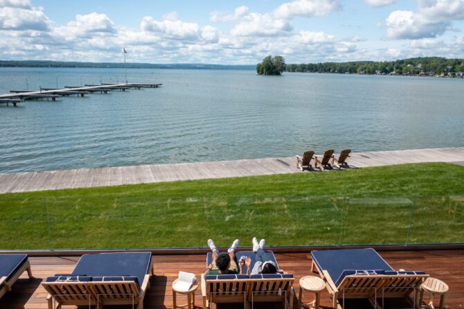 Lakeside relaxation with chairs and calm water view