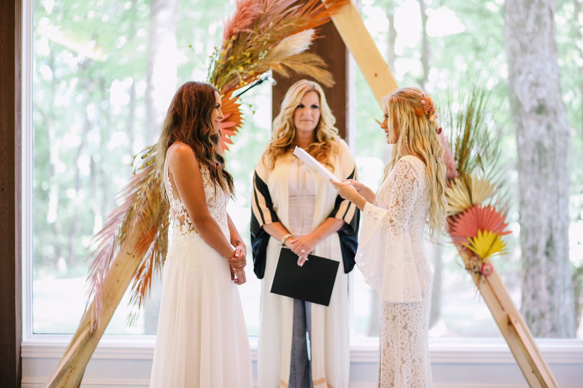 lgbtq brides bohemian pampas grass wedding ceremony arch - The “Invisible” Wedding Day To-Do List: Master the Tasks Every Couple Forgets Until the Last Minute lgbtq brides bohemian pampas grass wedding ceremony arch